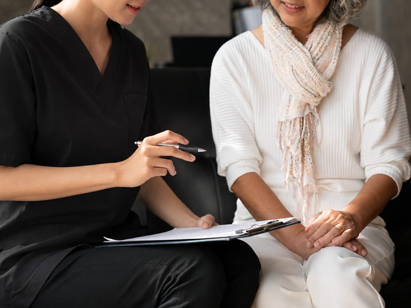 Patient consultation discussing treatment schedule and recovery