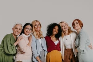 Diverse group of elegant women embracing skin health with confidence and beauty.