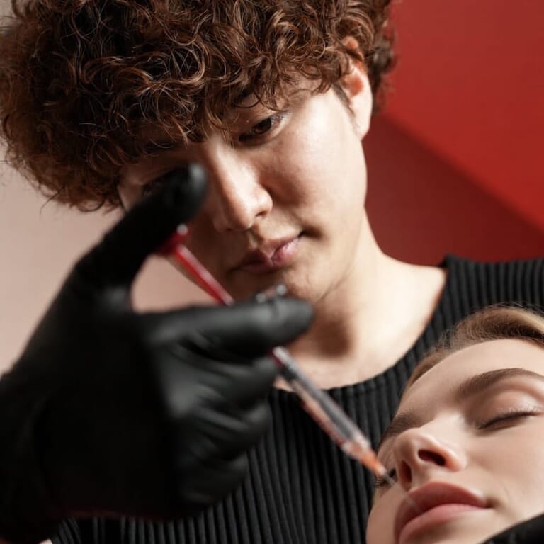 a scene showing a procedure being performed by dr. ikeda.